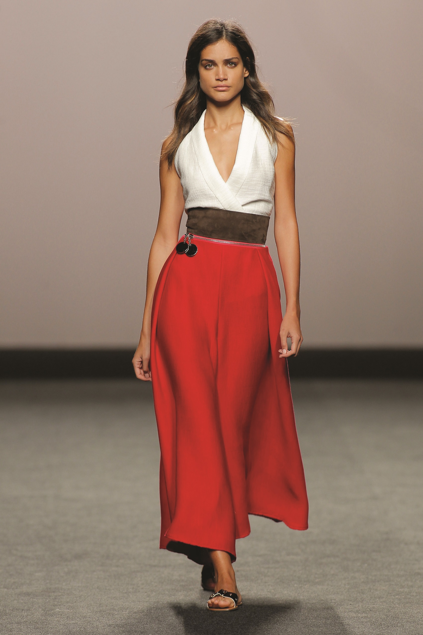 Marcos Luengo: White Halter Top, Red Full Length Skirt, Leather Belt 
