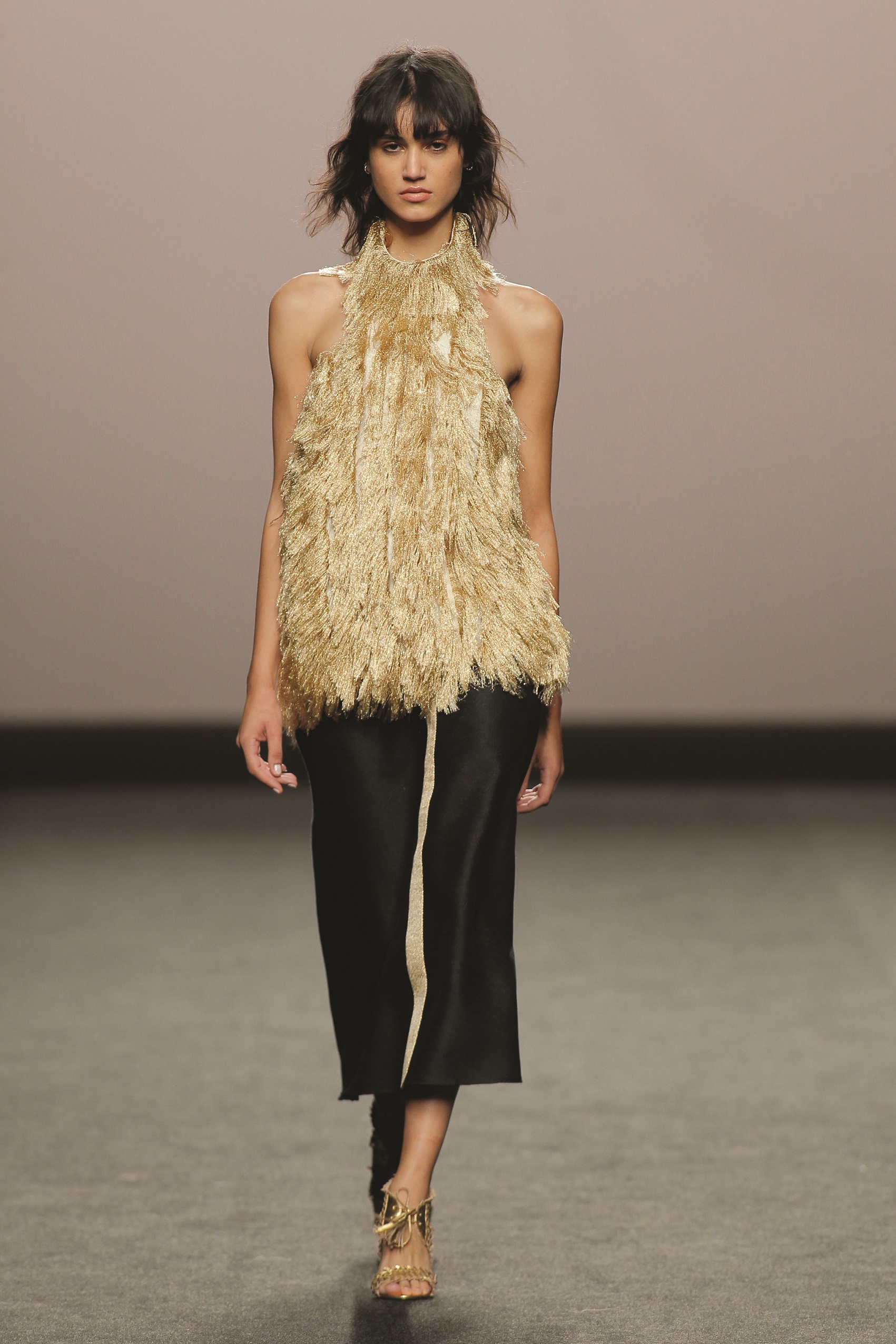 Marcos Luengo: Gold Fringe Top & Black Calf Length Skirt