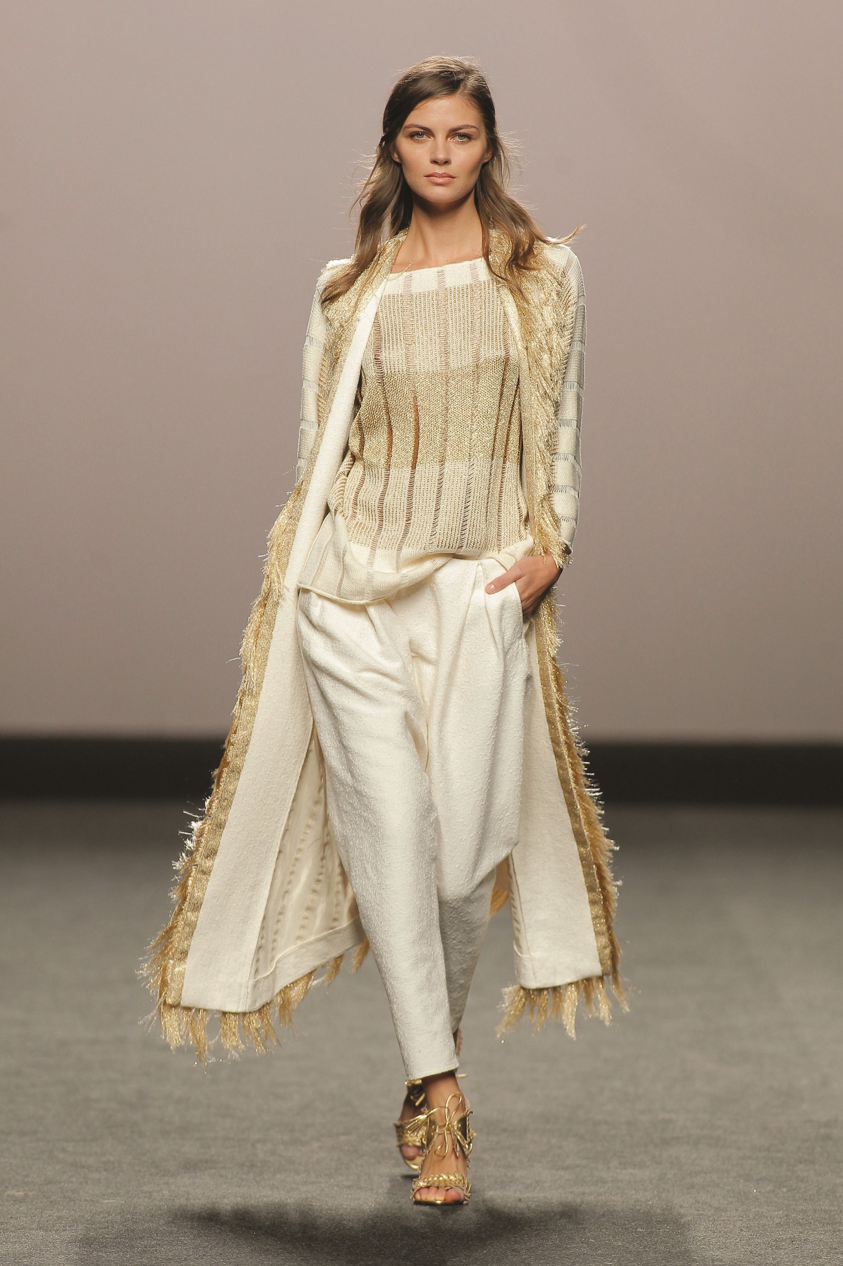 Marcos Luengo: White Trouser/ Cream & Gold Top And Overcoat 