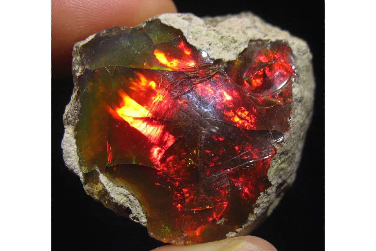 Fire Opal Still Surrounded By Its Matrix